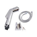 Chrome bathroom faucet set with spray head, hose, and mounting bracket on a white background